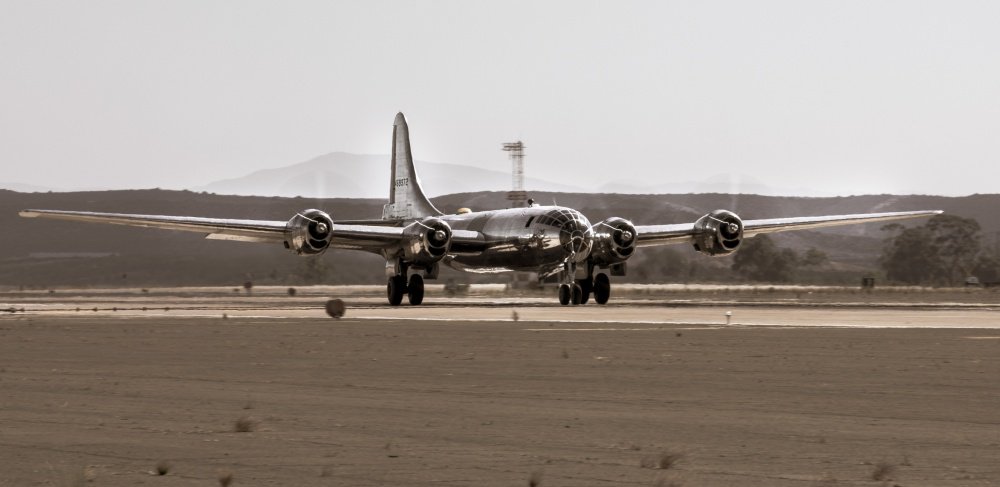 USPACOM's tweet photo. A blast from the past at @MCASMiramarCA #B29 Superfortress #Doc Takes Flight. #Doc is one of two #B29s that are still capable of flying after being used as a static display. @PacificMarines #SemperFi #Bomber #1942 #AirShow #FreeandOpenIndoPacific https://t.co/BkwrXzIMgK