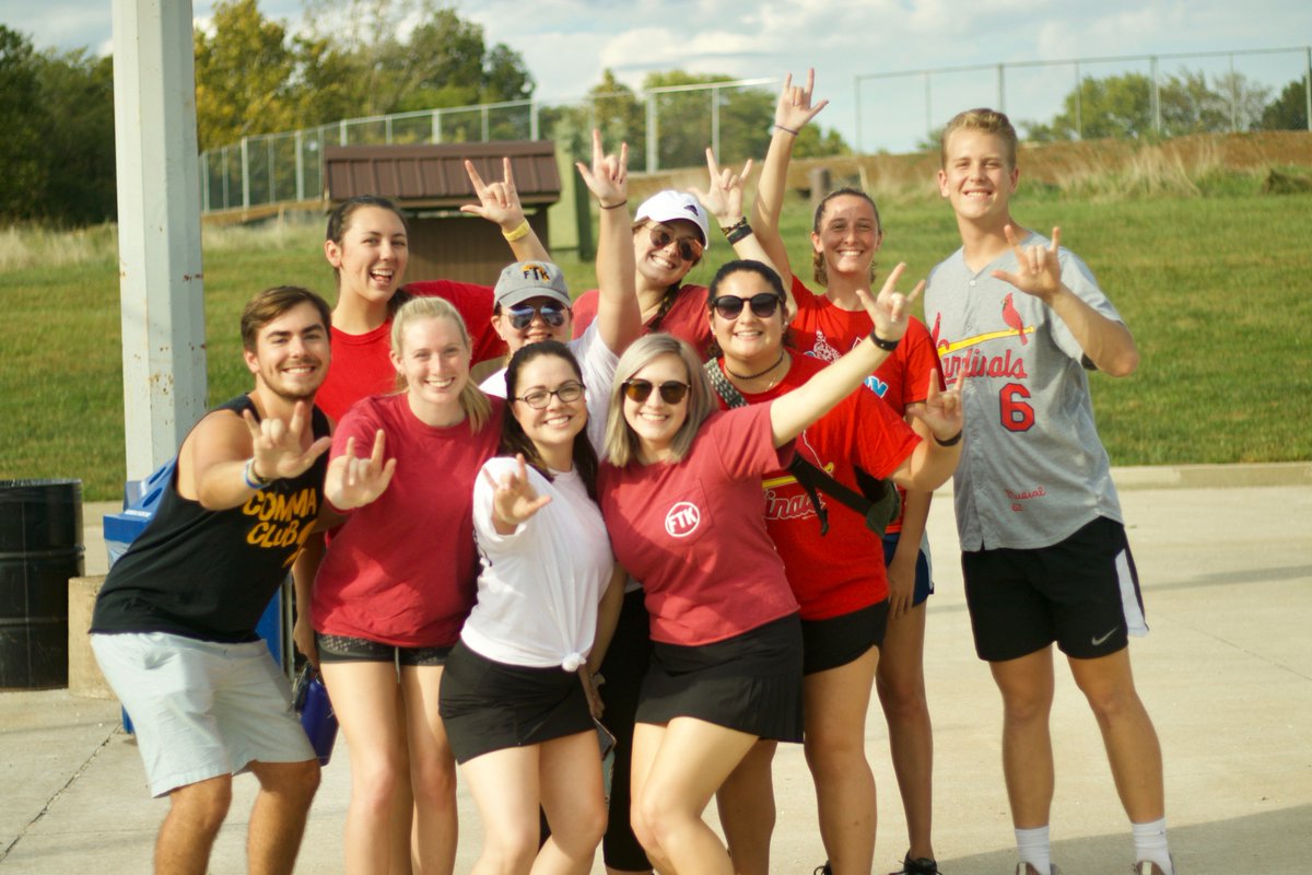 Throwin' what we know at Tommy's T-ball ❤️🤟
.
.
.
[Image description: 10 MizzouThon members do the MizzouThon hand sign]