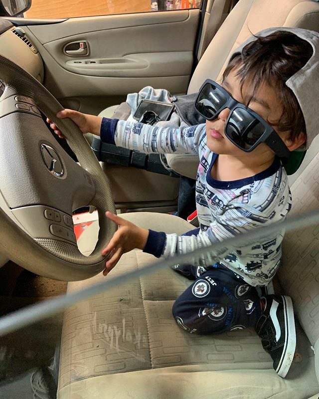 Pat_Lazo's tweet photo. They grow up so fast. When your friend @mmauler204 if fixing his brakes in your garage, your son jumps into his car, puts on his gear, and pretends to cruise for babes. 😆😂😂😂😎This was totally on Owen. No one convinced him to do this. Lol. #oursono… https://t.co/hpsxgJ0T7S https://t.co/ba1vfPvydF