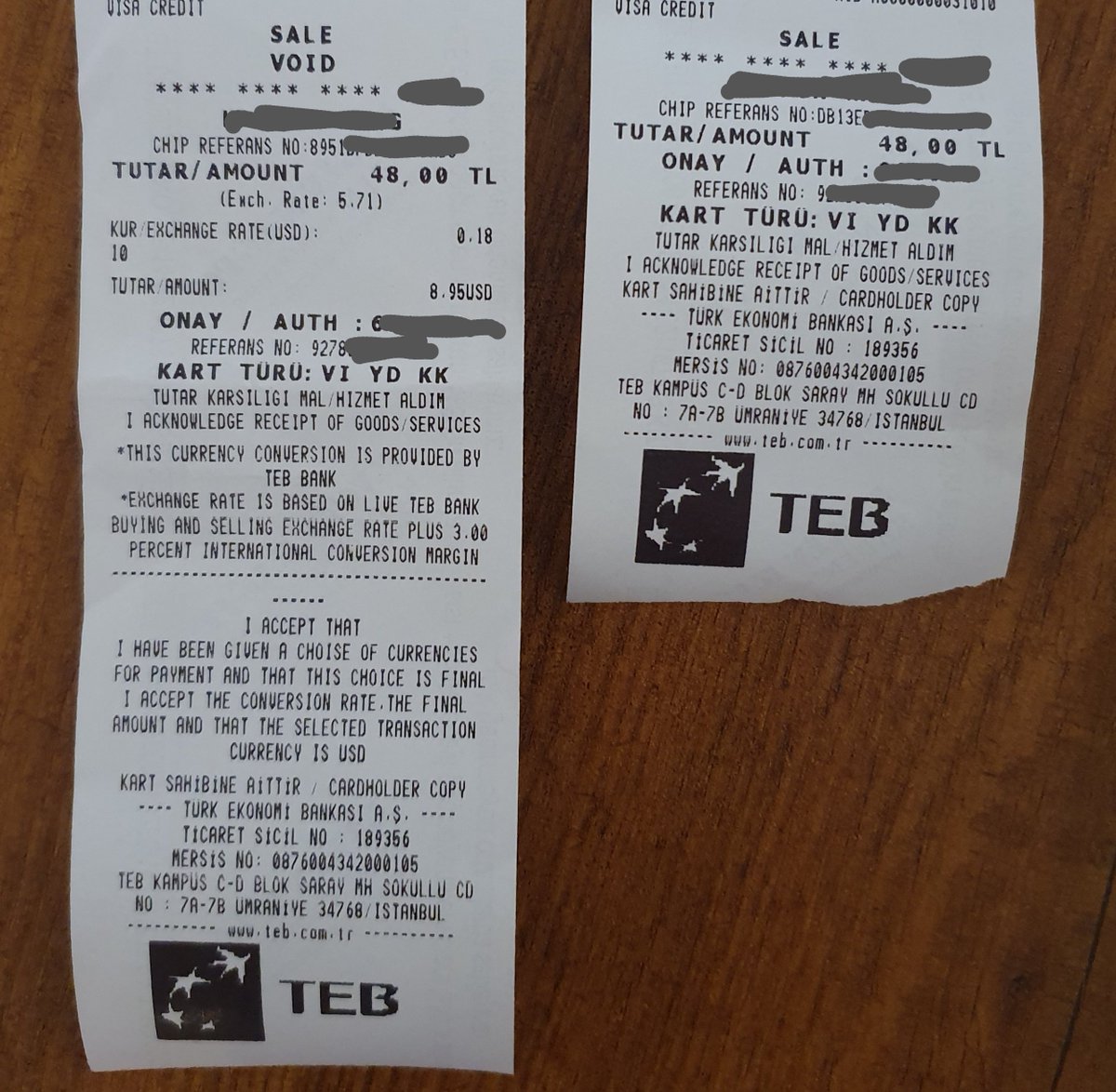 机场消费无比警惕DCC货币兑换陷阱！ 伊斯坦布尔机场burger king，问都不问直接给我用DCC刷美元，48里拉收我8.95刀，还有货币兑换 手续费。我拒绝签字要求直接刷土耳其里拉，还试图给我装糊涂。 左边是坑爹的DCC小票，右边是正常交易小票。碰到左边这种坚决拒绝签字。