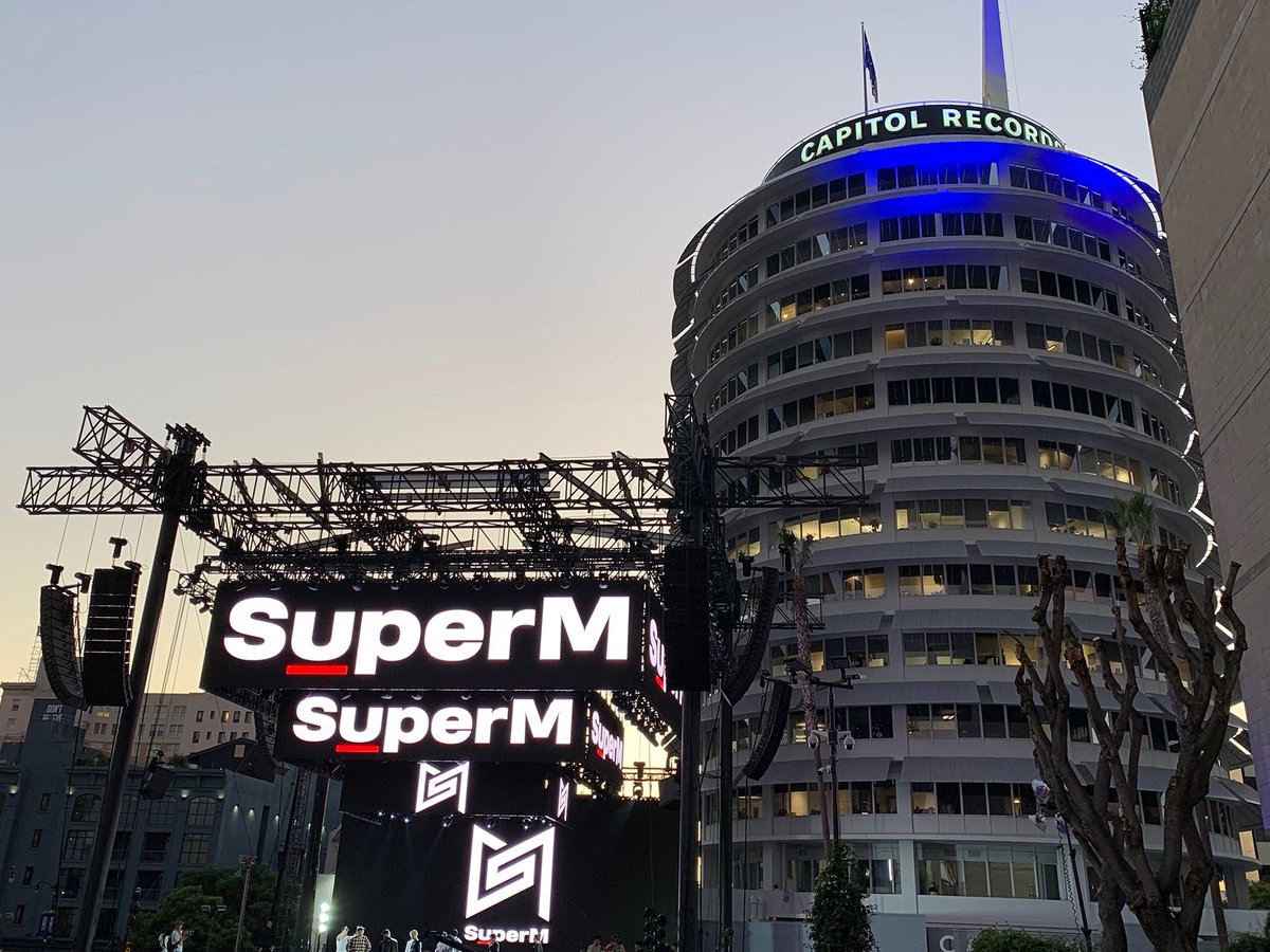 superm's tweet photo. "Stay Tuned for Tomorrow’s SuperM LIVE!~🎶

#SuperM_LIVE_FROM_CAPITOLRECORDS_IN_HOLLYWOOD #Rehearsal #WeAreTheFuture #SuperM #슈퍼엠 #SuperM_Jopping 
#SuperMtheFuture #SuperM_Debut_D_1 @superm https://t.co/6PtVjqATeA