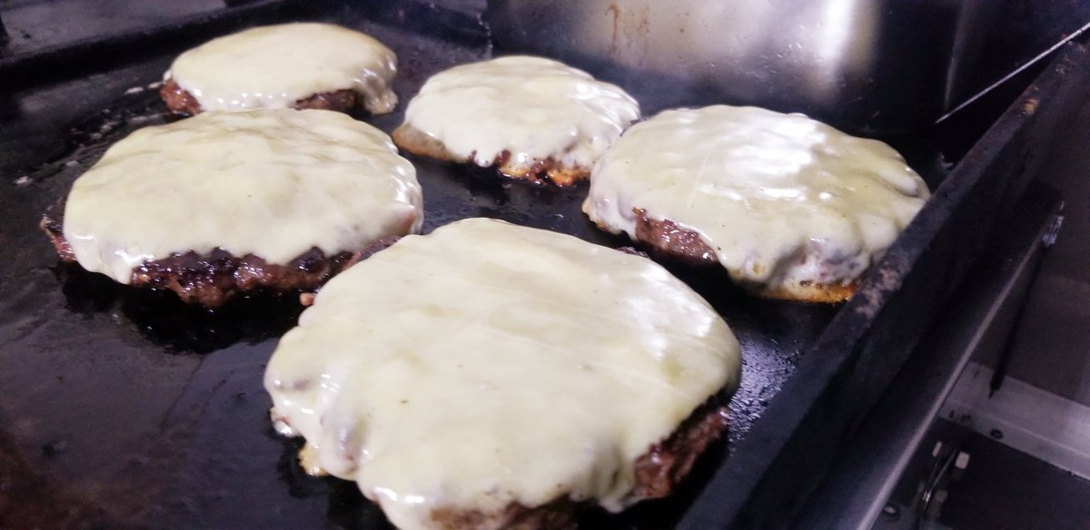 Our 180g beef patties being served up last night at @CrookHall for a 21st birthday party from our #VintageHorsebox Mobile Kitchen.