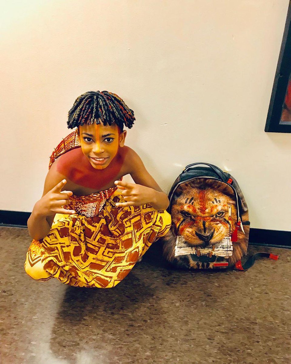 sprayground lion backpack