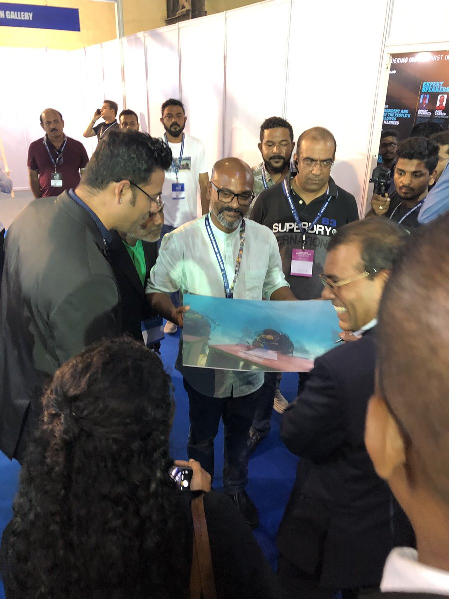 Finally <a href="/mohamedseeneen/">Mohamed Seeneen</a> gets the signature from president Nasheed for the very significant picture he took of the president , signing the climate change initiative from the Maldives  #underwatercabinetmeeting #ClimateChangeIsReal