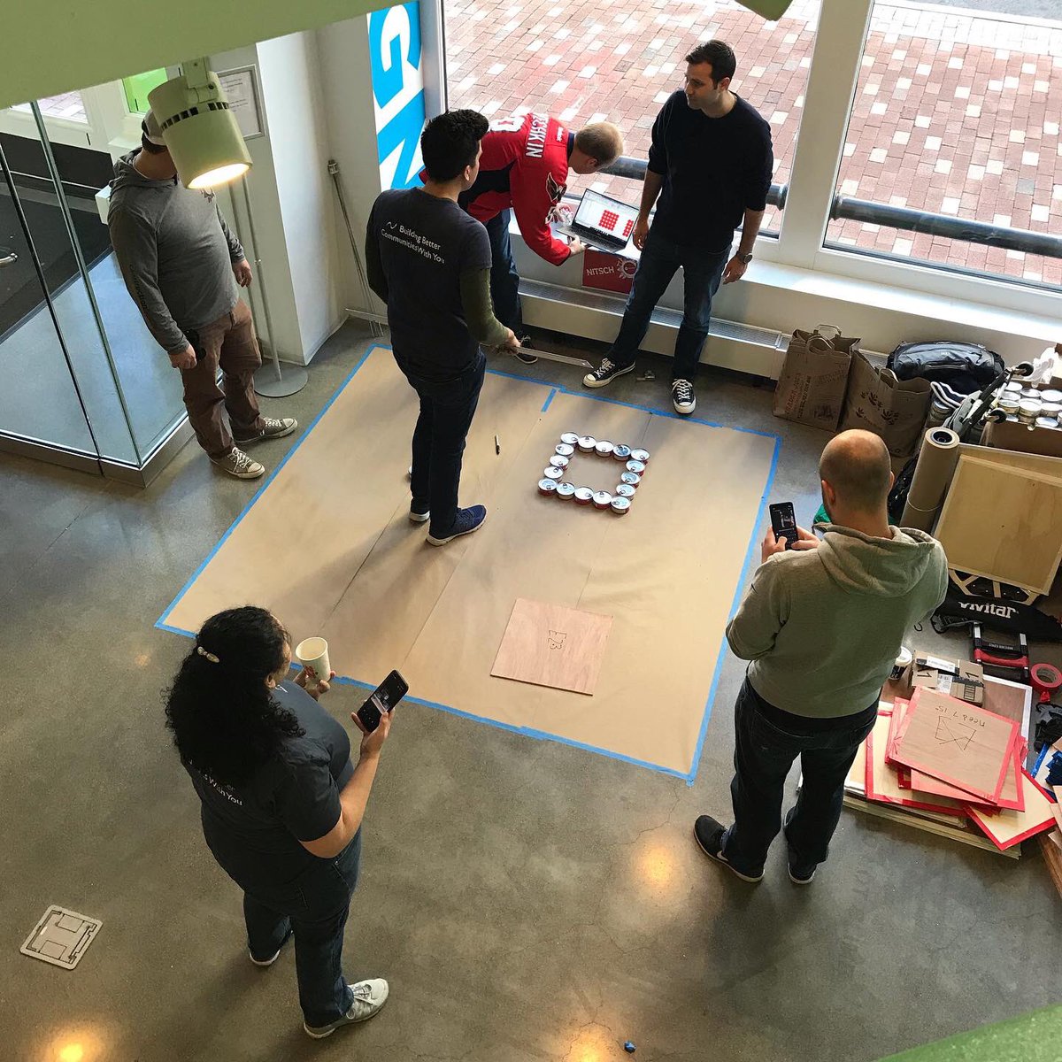 nitscheng's tweet photo. Excited to get things started at @canstruction_boston build day! Any guesses on what we’re building for the theme of Around The World? #canstructionboston https://t.co/M8P4vaSIaY