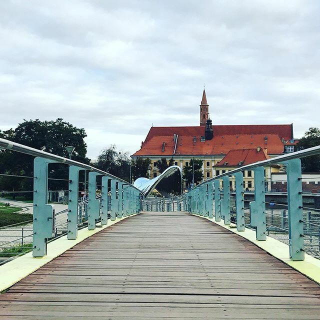 PolandIYP's tweet photo. View of The Nave structure on Wyspa Daliowa from the bridge joining Wyspa Słodowa with Wyspa Piasek. #Wroclaw islands and waterways are a beautiful site to enjoy a nice walk. 
#travelslow #travelsmart #travelguide #wroclawinyourpocket #wroclaw101 #visitw… https://t.co/gURUqj2EPX https://t.co/xs6bwHaMYI