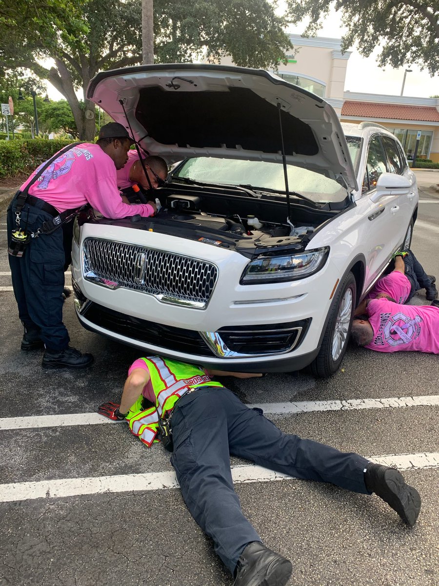CoralSpringsFD's tweet photo. Strange noises from your engine may be something totally unexpected, like a kitty cat!   It took quite some time to disassemble the engine compartment and put it back together after getting the cat  out.  Great job Station 80!  #Meow https://t.co/WvfVjLgHVa