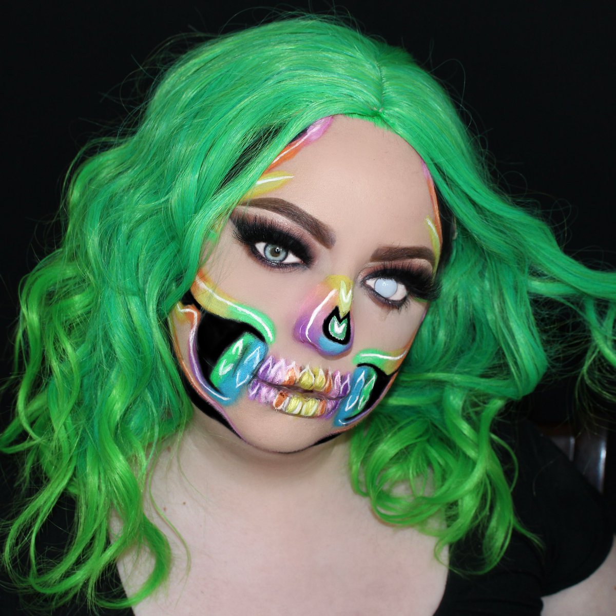 lauracristinax's tweet photo. DAY 4 of 31 DAYS OF HALLOWEEN is a neon skull!! I used the @mehronmakeup paradise paint in black, white, orange, green, and light pink @SuvaBeauty hydra liners in dance party, fanny pack, and grape soda @bperfectcosm carnival xl pro palette #skullmakeup #neonskull https://t.co/Xk1lAjo6tQ