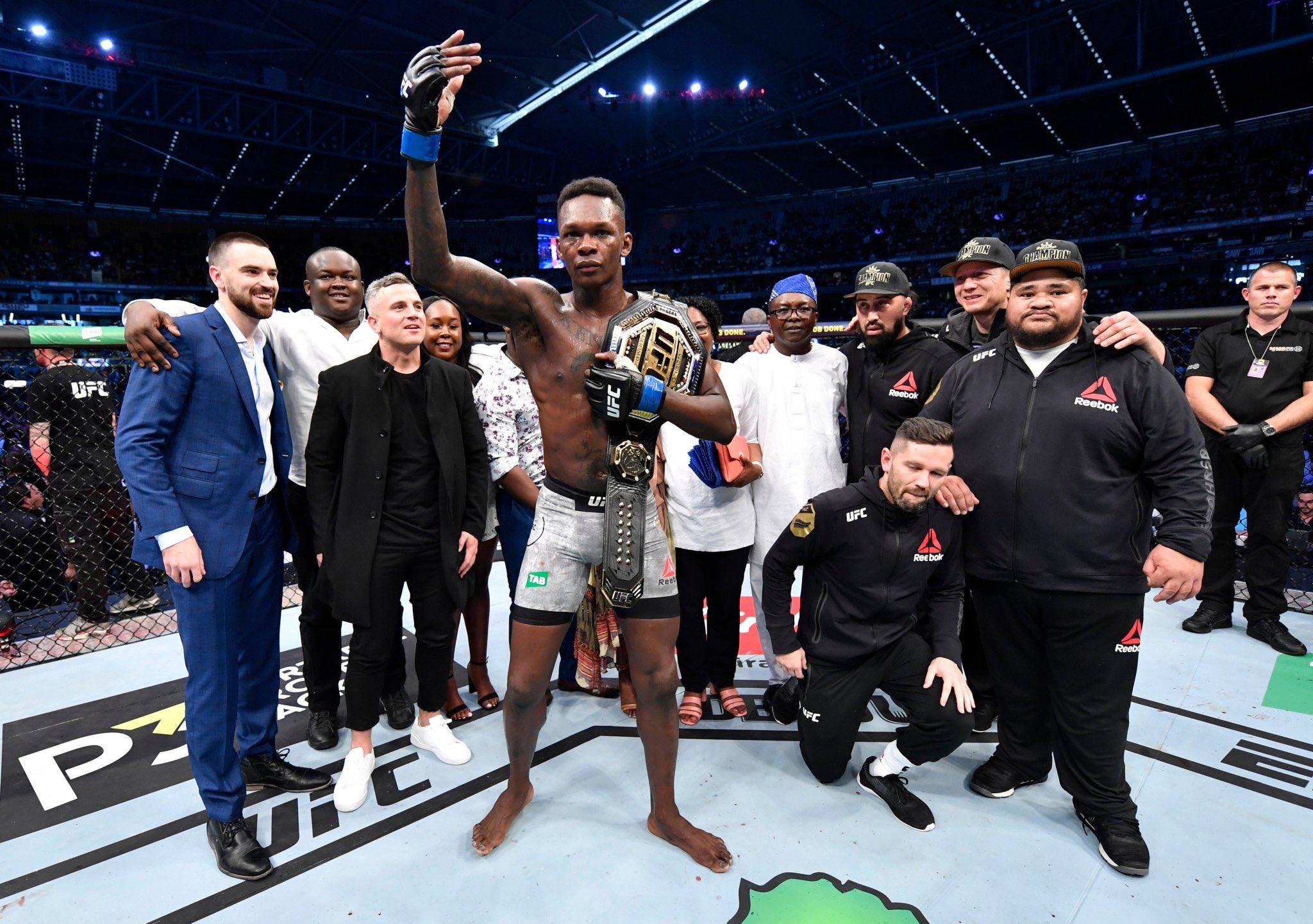 Israel adesanya deals reebok