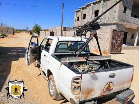 Oded121351's tweet image. #Libya- 2 #GNA technicals captured by #LNA south of #Tripoli, 1 with an interesting camo scheme, the other with a pretty rare M2 Browning .50 cal HMG