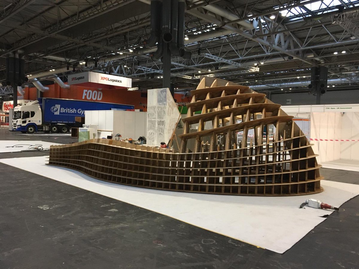 leonard_design's tweet photo. After its residency in Nottingham’s Old Market Square the #SocialShell, developed by Leonard Design & @ArupUKIMEA, has now been transported to @UK_CW at @thenec and it’s looking great! #UKConstructionWeek #Plywood #ParametricDesign #CNC #pavilion #design https://t.co/XN5TXf45DZ