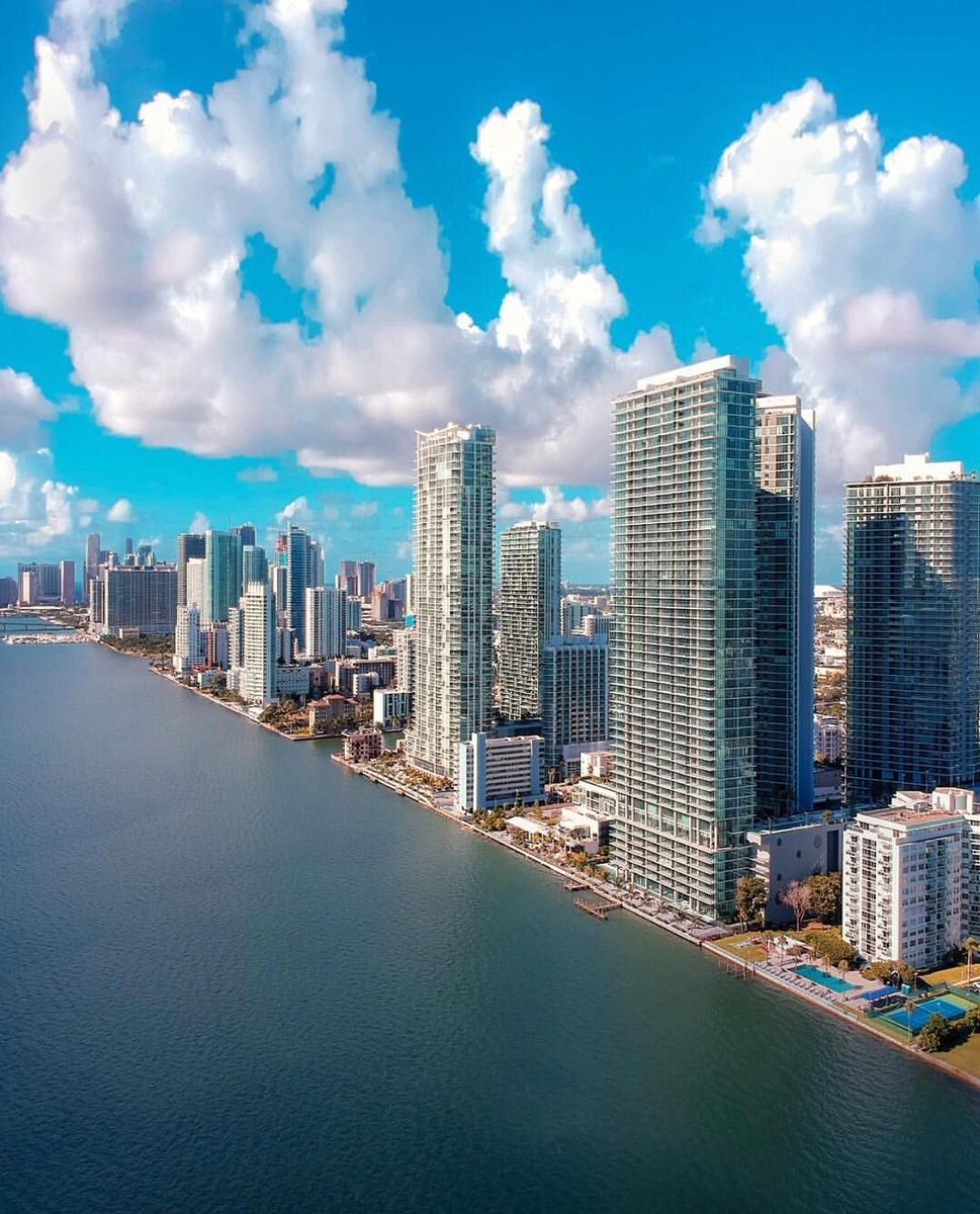 TheREIMeeting's tweet photo. For some, this is just a modern city. For others, this is PARADISE! #Miami #realestate https://t.co/b1IIELjiya