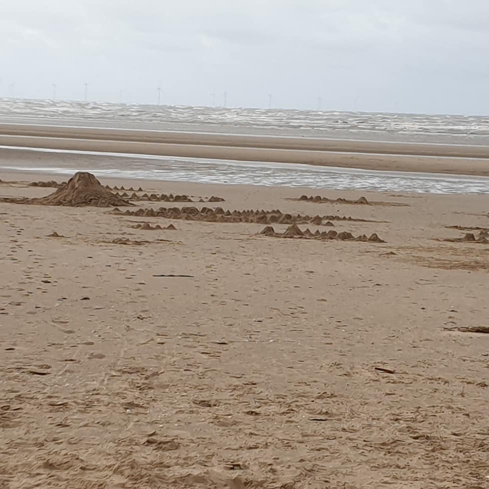 AtkinsonThe's tweet photo. First There is a Mountain,  Katie  Paterson touring artwork is at Formby beach today. Make sandcastles in the shape of mountains #firstthereisamountain #nationaltrust #formbybeach https://t.co/YNVtLUJYlJ