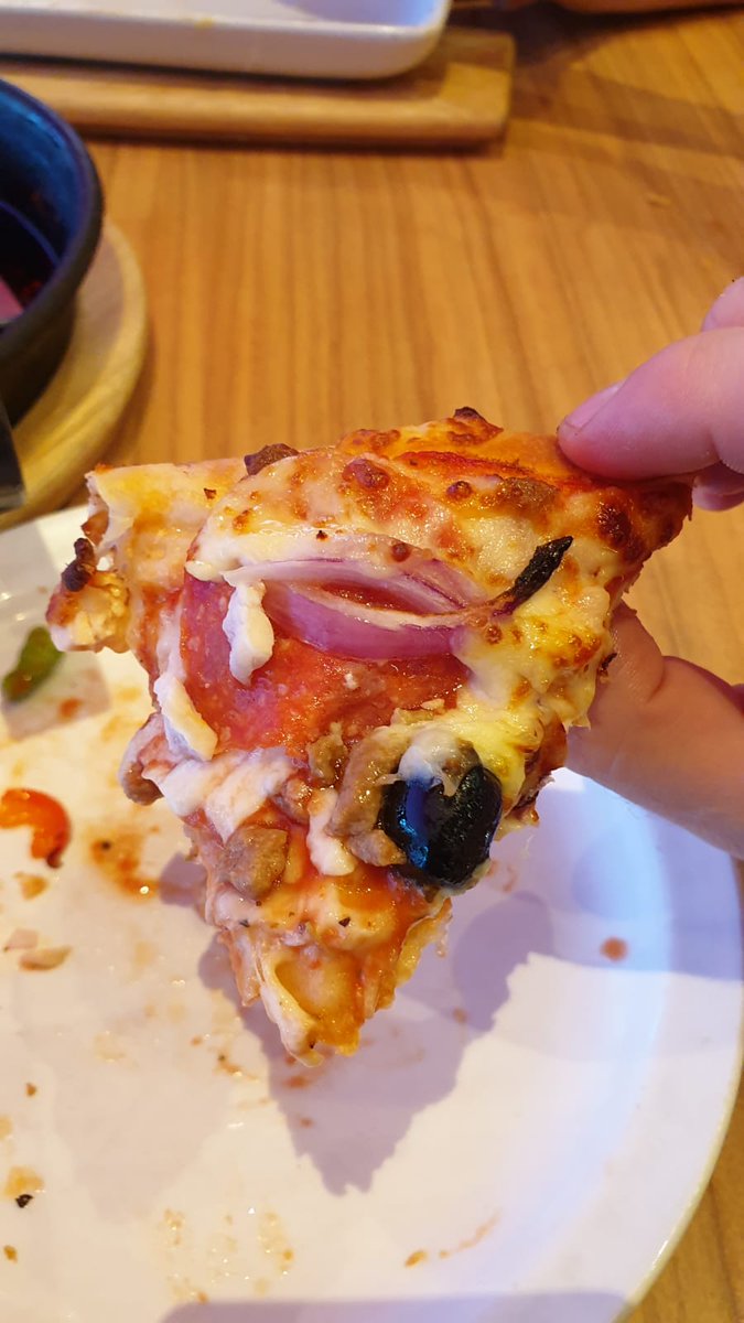 SamRichx's tweet photo. If @pizzahutuk really is life, then why did we get served undercooked tiny pizzas? (This was the second one, we sent back the first one for having nothing on top) #verydisappointed #thispizzawasntlife #pizzahut https://t.co/AHsSvyMHPh