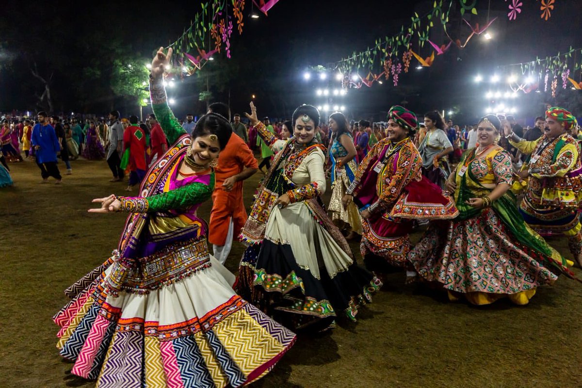 TravelSeeWrite's tweet photo. I have seen Garba at various places but the #UnitedWayGarba of #Vadodra is something else. 40,000 traditionally clad people from 8-80 years of age joyously dancing in sync on folk tunes. Itโs a must attend event. #LetsGarba #GujaratTourism @GujaratTourism #NavliNavratri2019 https://t.co/3yDGAa6NEP