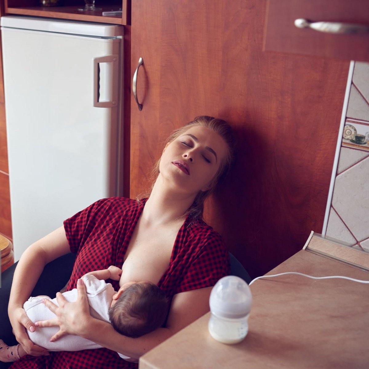 Yes! A Mom can be tired, because she's a human being. But, her love is never tired. A baby nursing with a mother is an undeniable affirmation of our rootedness in nature's love. dinkyninky.com #Motherhood #Nursing #Momlove #Baby #Breastfeeding #Mama #Mom