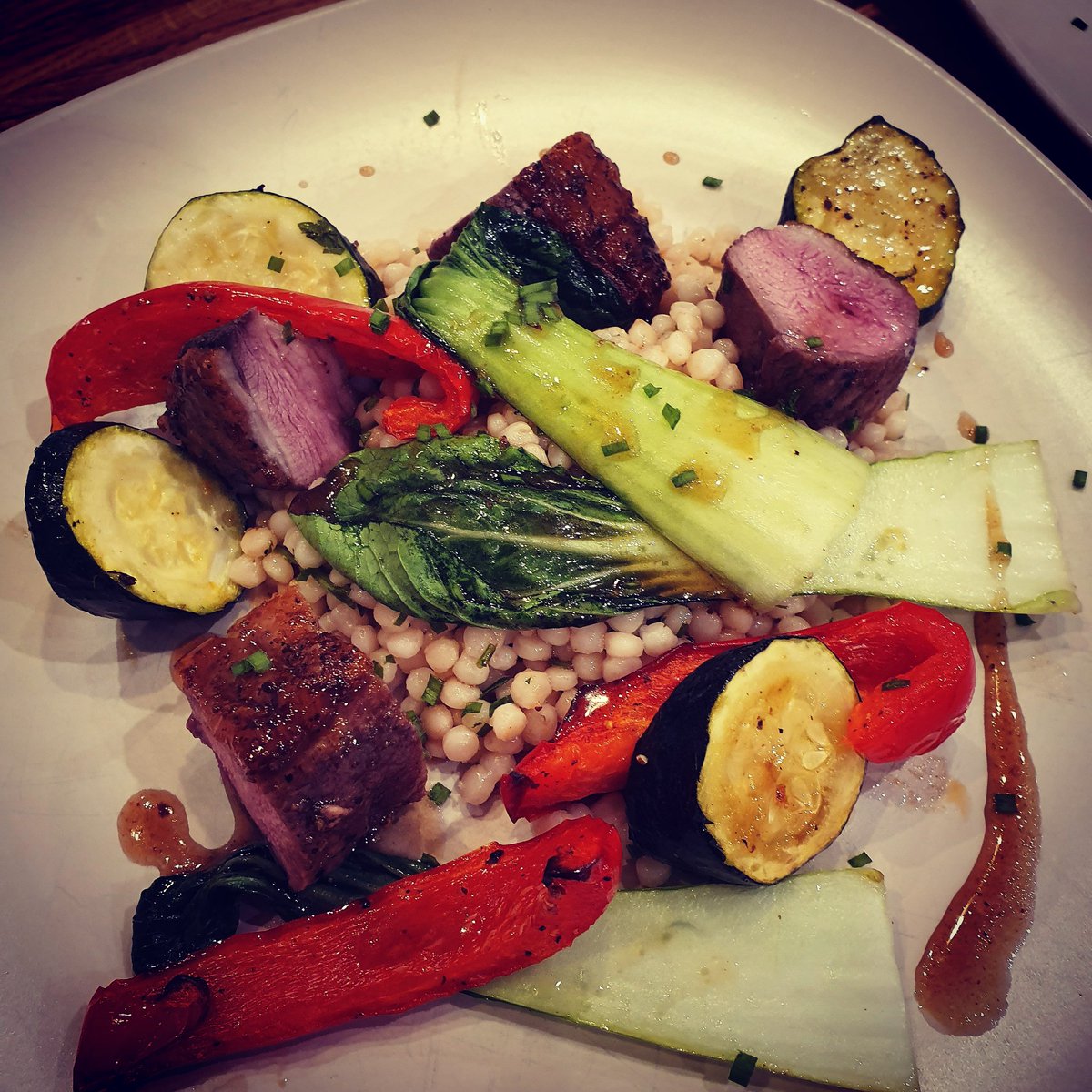 mjdellarmi's tweet photo. Duck, honey, cous cous, tomato water, roasted vegetables for dinner tonight
#messyplate #gressinghamduck #pakchoi https://t.co/VUsmxk1VqD