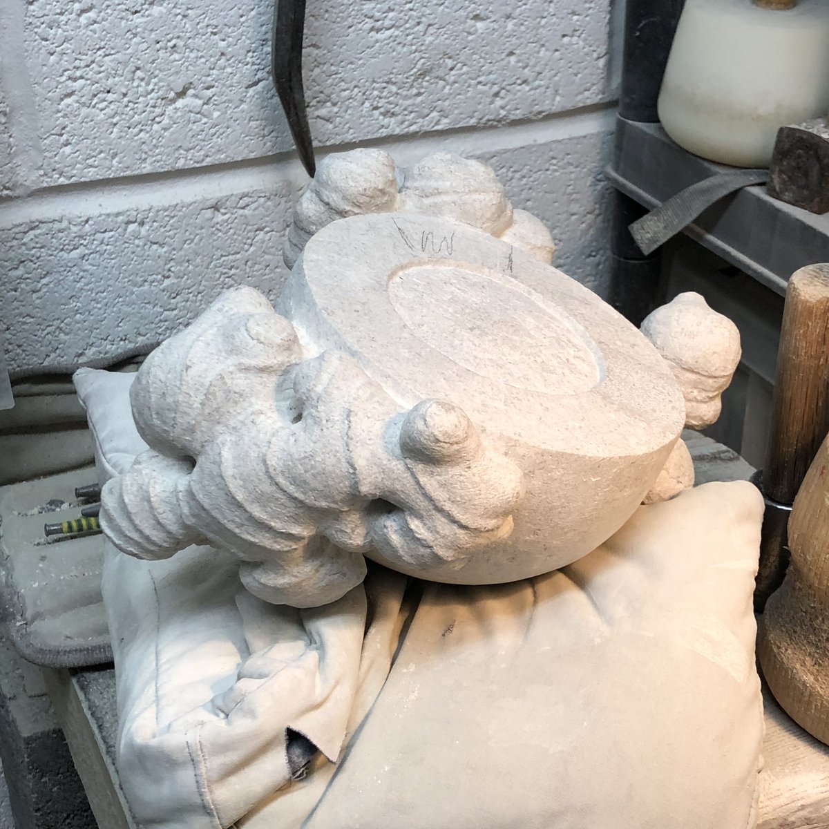 Work in progress on ginger root alter vessel, carved in Portland limestone. Carvings on Instagram @marciabennettmale