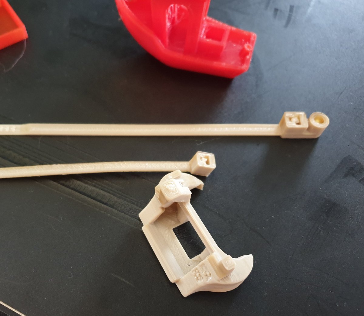 pcpointer's tweet image. First PEEK result with a modified Prusa i3 MK3 from PCPointer.de. print is a fan duct. 

Temp 412/132°C/Chamber : 45-50°C
Print speed: 10mm/s; 0.2mm layer height 

#prusa3d #sliceengineering #pcpointer #mosquitohotend #3Dprinting #3dprint #3dprinted #peek