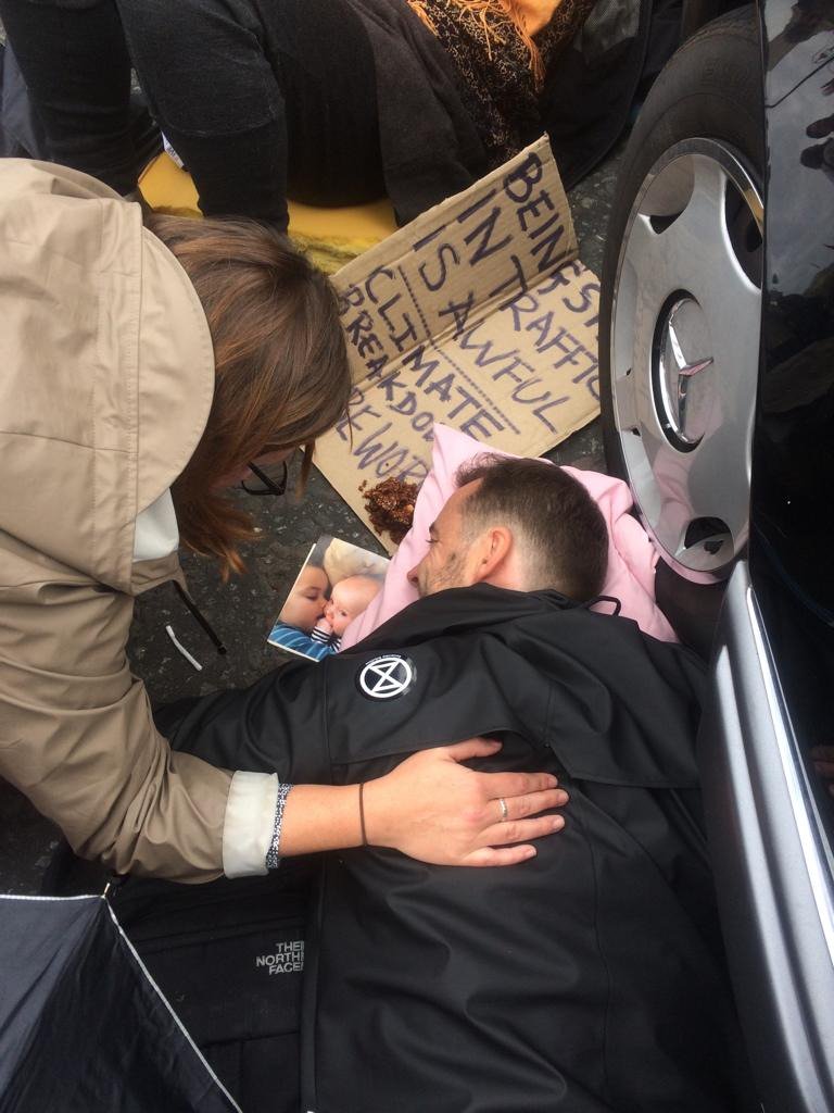 XRebellionUK's tweet photo. People are rebelling in these numbers because they realise the time to address this is right now, not in 2050, or even 2025. Scientists are despairing because we are almost out of time. They are telling us to panic. #RebelRadio is broadcasting. Tune in! https://t.co/0ye4ULz4Bc https://t.co/PZqRhl26fm