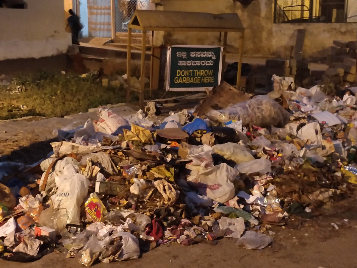 VinayaTotagi's tweet photo. The street opposite to BJP office, Malleshwaram, with a sign that says "Do not throw garbage here".
@BBMPCOMM @swachhbharat https://t.co/927DMhvucd