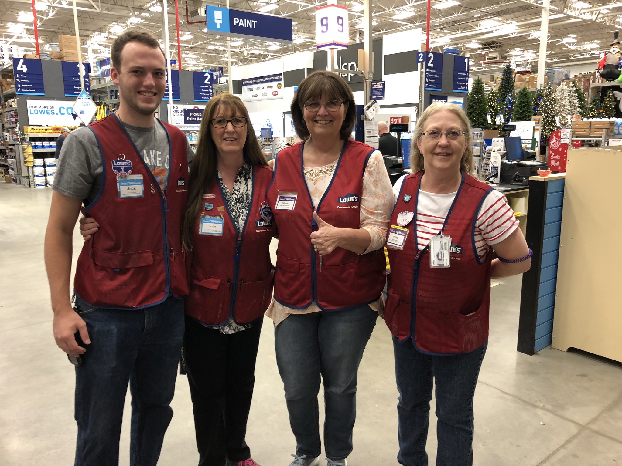 charlesatlowes-on-twitter-red-vest-ready-today-we-welcomed-niese-to-our-team-and-she-has-earned-her-red-vest-head-cashiers-jack-ann-and-front-end-csa-louise-present-her-with