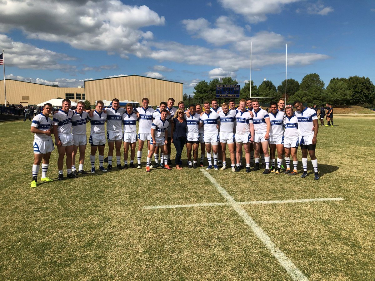 ZoomieMensRugby's tweet photo. Ami Shea with Zoomie Blue at Navy. Her husband Kevin is the namesake of the Shea Cup. Read about the Shea Cup on https://t.co/UJVUtQg03k https://t.co/ydJn340ZJ0