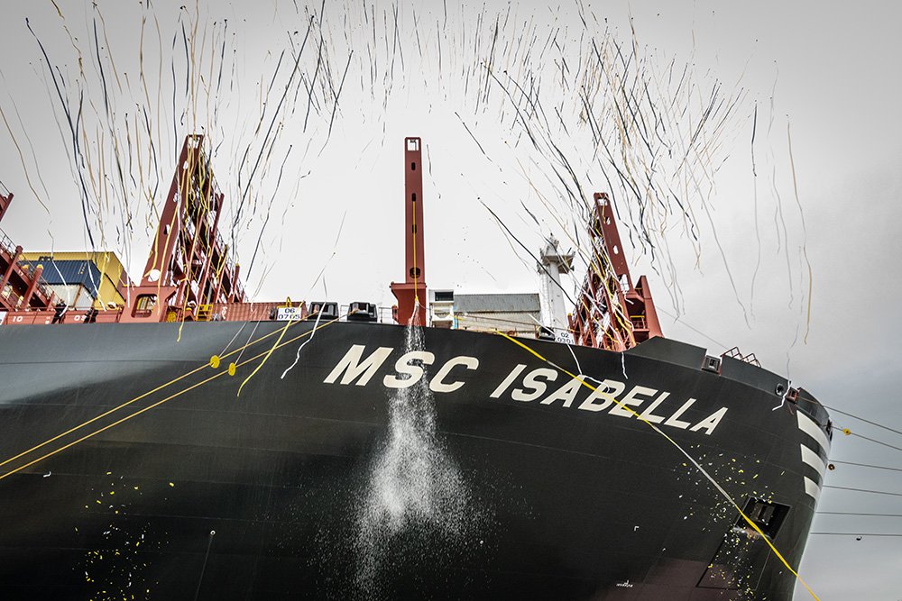 MSCCargo's tweet photo. "I name you, MSC Isabella!" Earlier today, the MSC Isabella was named at a ceremony in the Port of Felixstowe. The ceremony was graced by the young godmother, Isabella, whom the vessel is named after. 🍾🚢🎊 #MSCIsabella https://t.co/OuPNgkALdI