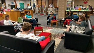 godwin_library's tweet image. Mr. Young&apos;s class came in to pick up a new choice read...and spent a little time reading them as well.  And...our library aides decided that today would be a good day to bedazzle some of our library passes.