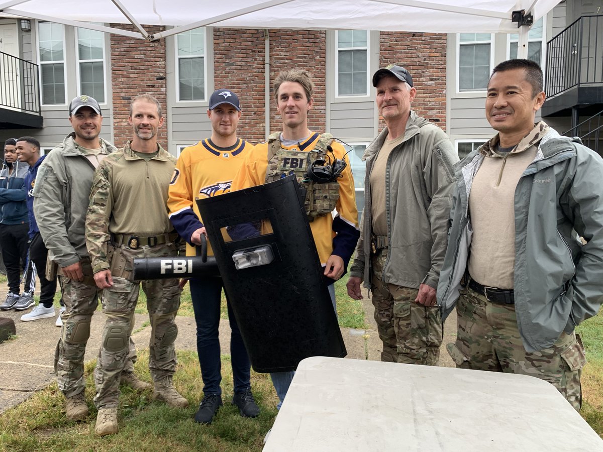 PredsNHL's tweet photo. Colton Sissons, @kyleturris and @Gnash00 participated in interactive stations with SWAT, Intelligence and Evidence Response teams with kids from @westnashdc for #CRDay!
#Preds | @PredsFoundation https://t.co/0Hu5FpwaJL