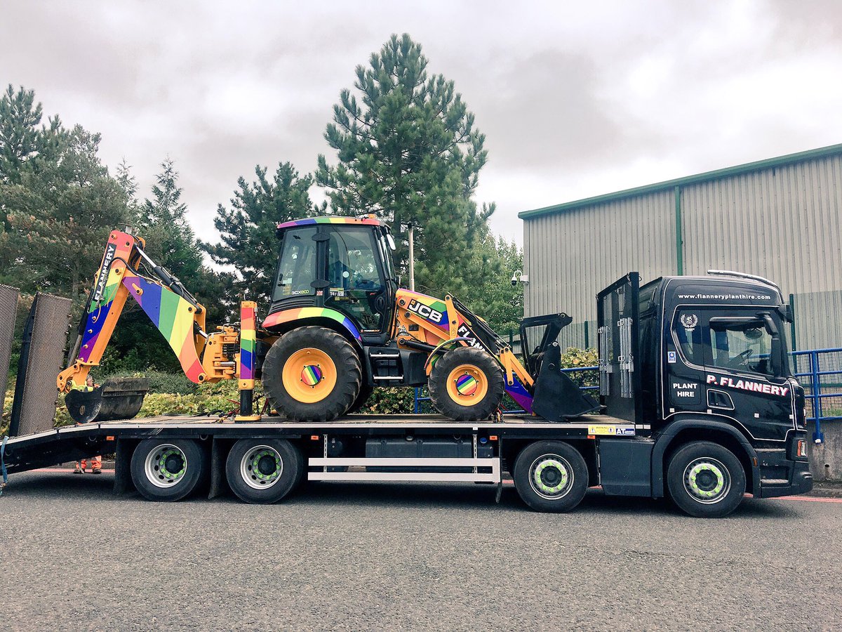 LGBTconstruct's tweet photo. We have arrived for @UK_CW - check out @BuildingEqLGBT stand together with @Flanneryplant #RainbowJCB - supporting #LGBTQ #inclusion in #construction https://t.co/52eLOM5xmk