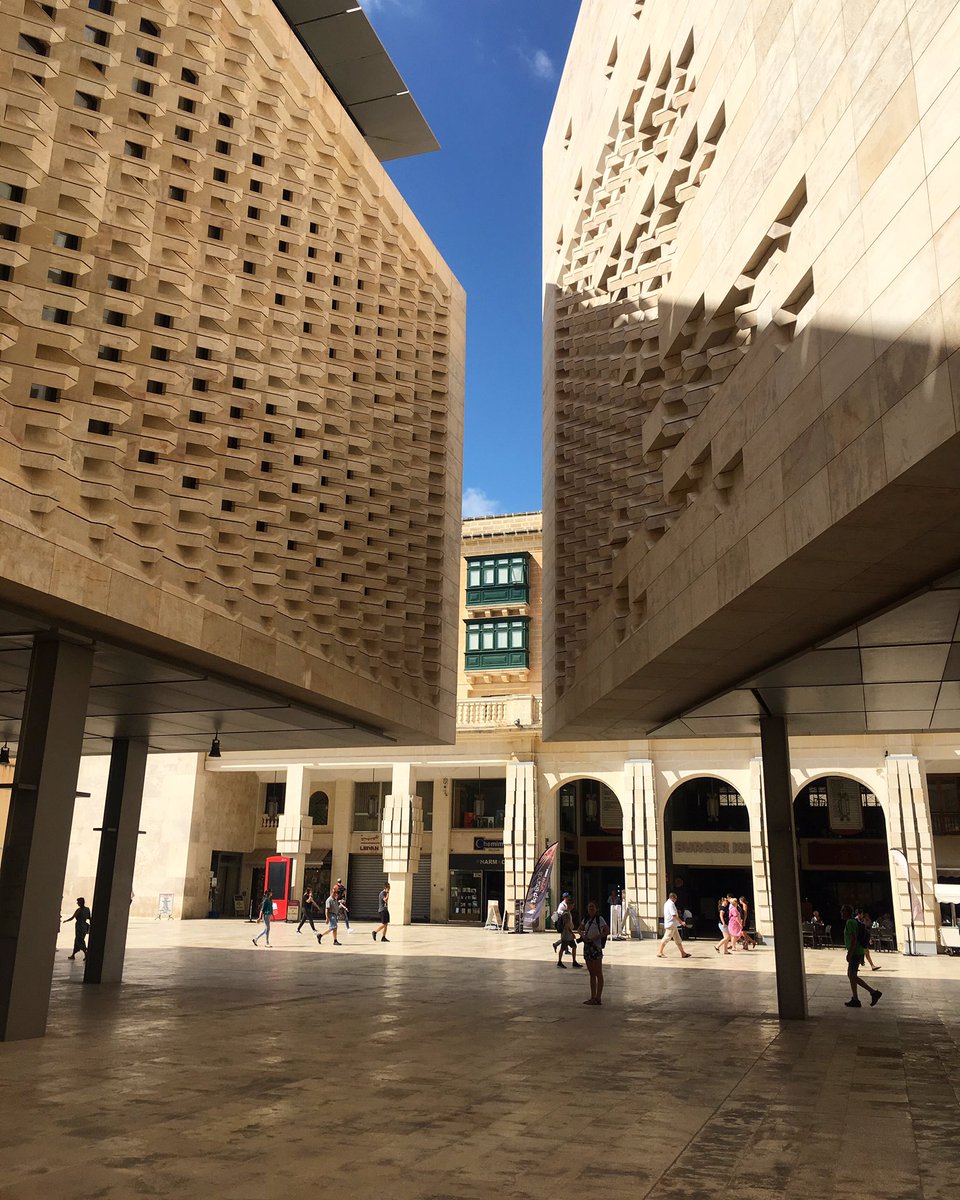 InSearchofChoc's tweet photo. The seamless transition from #modern to #heritage , city gate and building by #renzopiano . #visitvaletta #visitMalta #TravelTuesday #inspiration #architecturalmasterpieces https://t.co/UqXENbZYU4