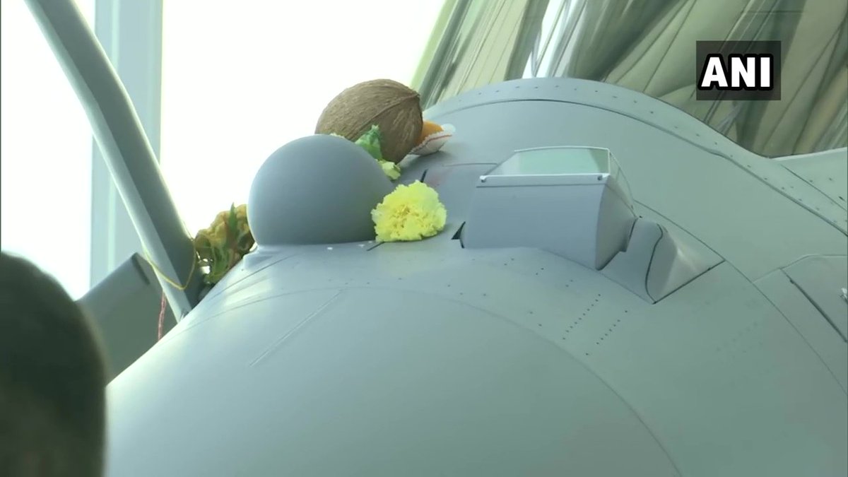 ANI's tweet photo. Mérignac(France): Defence Minister Rajnath Singh performs 'Shastra Puja', on the Rafale combat jet officially handed over to India. https://t.co/M7SHuSBcD2