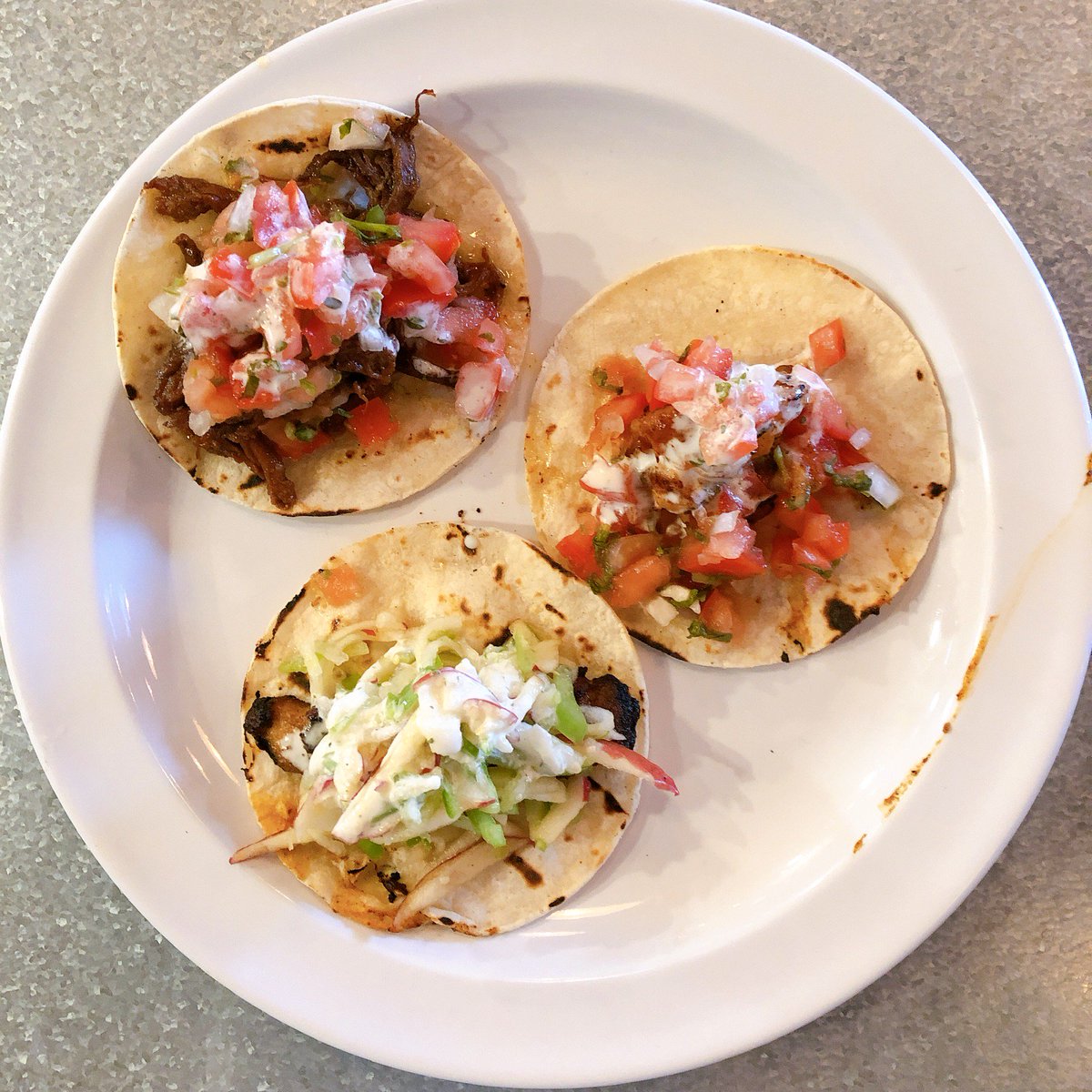 BabyBluesBBQ's tweet image. All your favorites from brisket, chicken, shrimp, pork and fish smothered in tangy crema, fresh bbq sauce, pico de gallo or apple jalapeno slaw, lovingly wrapped in a soft corn tortilla. Now, that's how you do a #TacoTuesday!!! 
#tacosforever #bbqsauce #jalapeno #damnthatsdelish