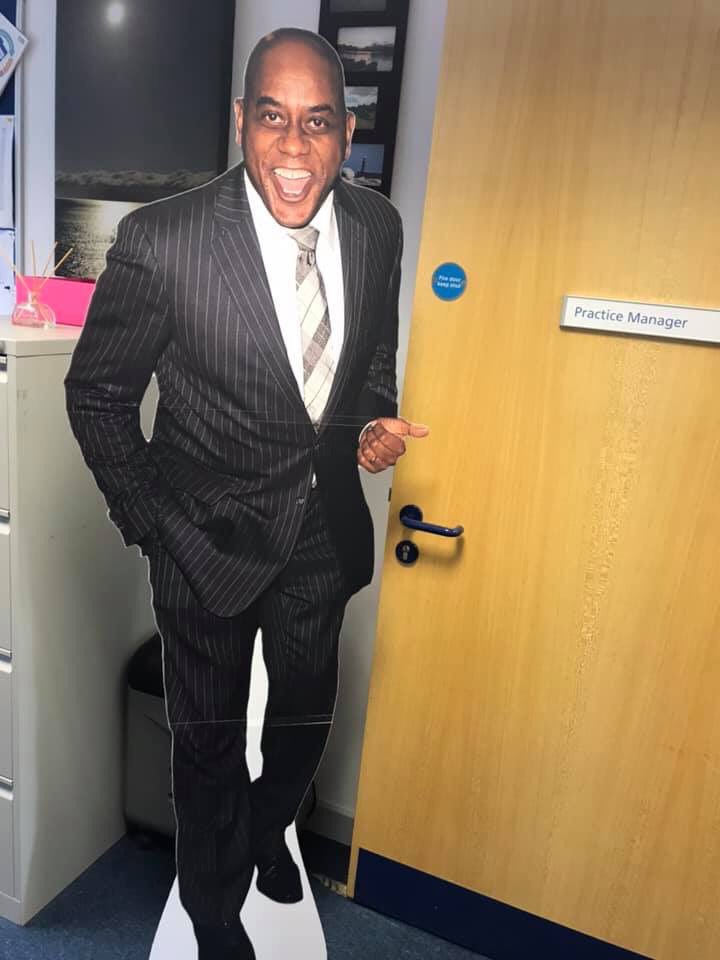 m4pres's tweet photo. When your wife is over the moon her boss bought her a life size cut out of Ainsley Harriot for her office at work @AinsleyFoods https://t.co/wyPHlEvusW