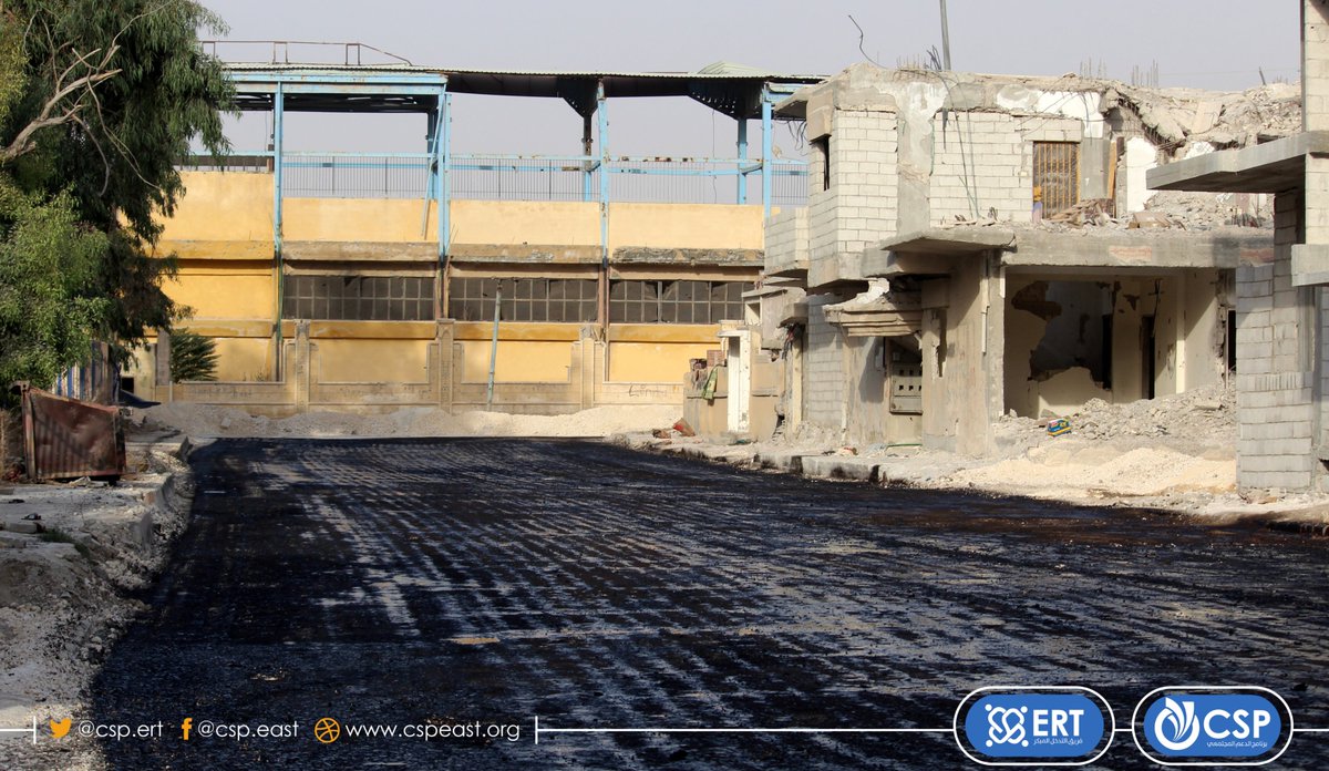 The photo was taken in Al-Fardous neighborhood, in front of the municipal stadium in #Raqqa city after #ERT had finalized spreading the aggregate, leveling and compacting it, and spraying MC0 material