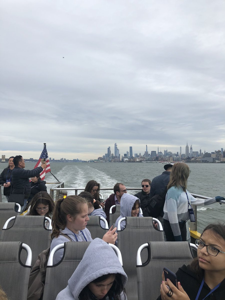Statue Of Liberty, Ellis Island, New York City Skyline.