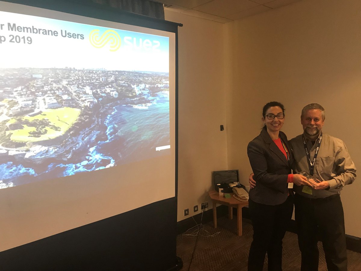 MsKMSutherland's tweet photo. At the SUEZ WTS UK Drinking Water Membrane User's Group conference, Ana-Rita Dias presents Jim Imrie with a recognition award for his contribution and support for the European, Middle East and African regions. Congratulations Jim! #sueztechnologies #ZeeWeedImpact https://t.co/em5rDGyiyG
