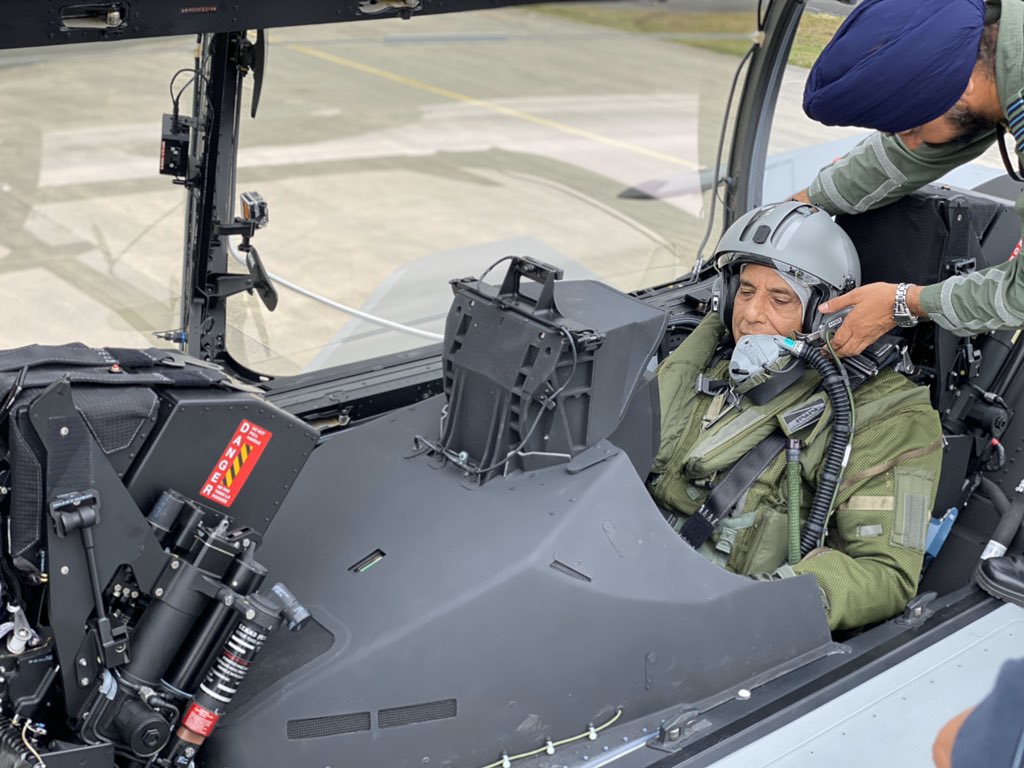 rajnathsingh's tweet photo. Taking a sortie in Rafale was a memorable and once in a lifetime experience. The induction of Rafale will go a long way in strengthening our national defence. 

India will receive the first 18 Rafale jets by February 2021. By April-May 2022 we will receive all 36 jets. https://t.co/we4UeSwdG5