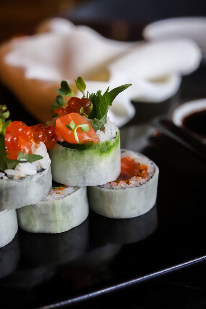 We’re firm believers that presentation matters almost as much as taste. Beautifully designed sushi rolls with delicately placed roe and fresh herbs are really something special. Who wants to try this roll?!