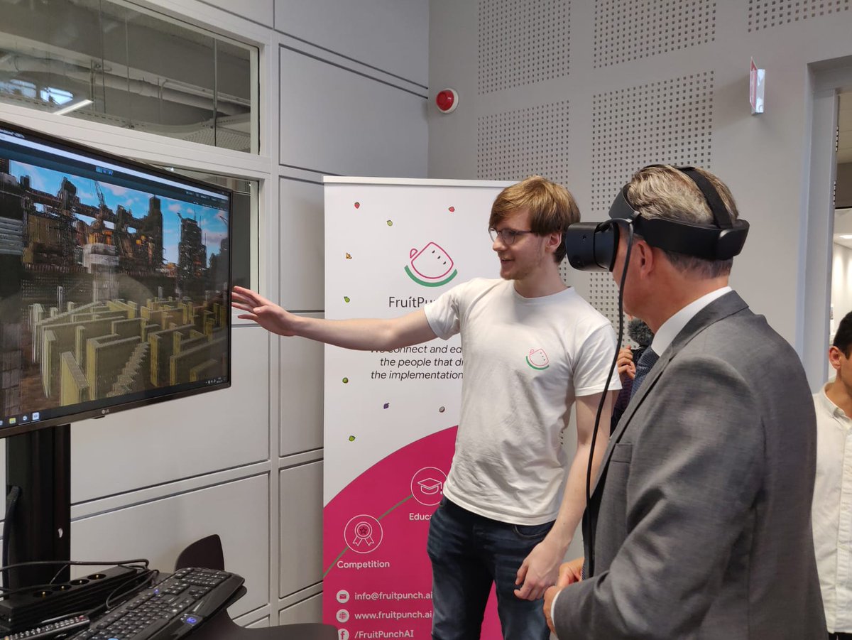 fruitpunchai's tweet image. The Executive Board of the @tueindhoven was very enthusiastic about our brand new #VR tech demo! 🍉 They had an exclusive sneak peek of our self-developed world for our new #AI esports competition with the theme &apos;Human + AI cooperation&apos;; fruitpunch.ai/competition 🤓 

#aiforgood