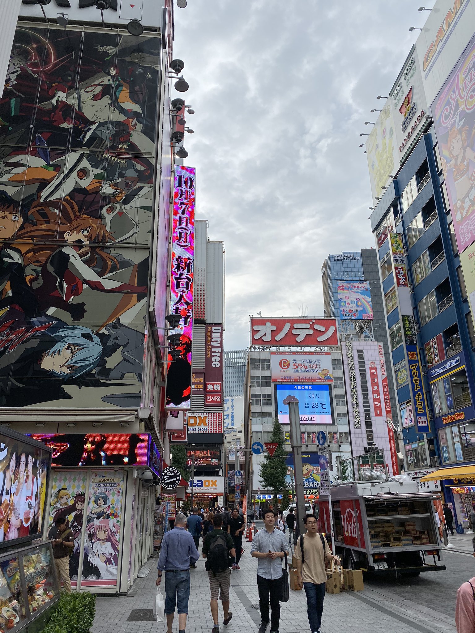 Anime Akihabara Neon Dream many colourful reflection on the wet streets