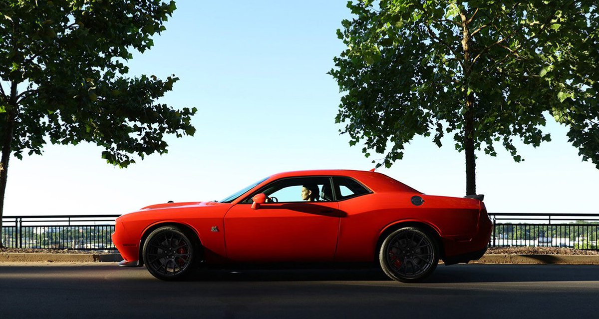 Even in park, the iconic design and aggressive lines of the Dodge Challenger exude speed.