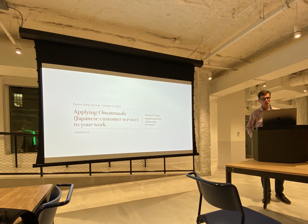Our second talk is underway. @mtoppa is giving Boston an encore presentation of his <a href="/railsconf/">RailsConf</a> 2019 talk “Applying Omotenashi (Japanese customer service) to your work.”