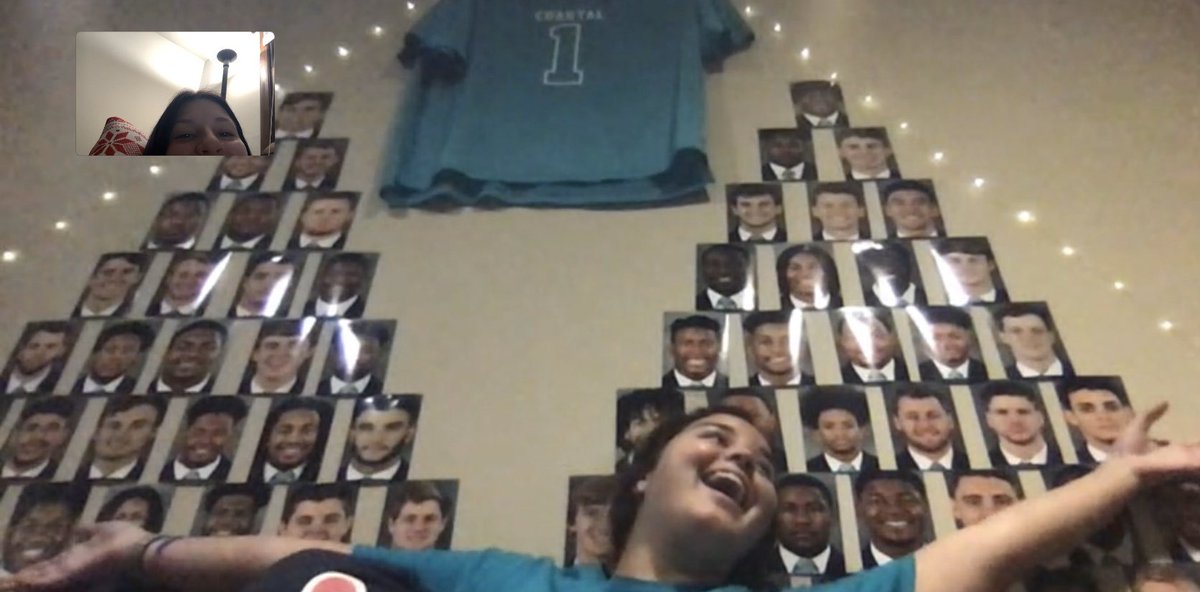 tinkysphatass's tweet image. caitlin enjoying her @CoastalFootball shrine before they force her to take it down :/