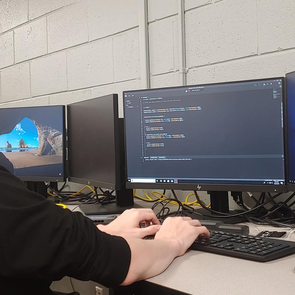 Here is our programer for VEX creating code to test the robots drive train for the upcoming VEX competition! Good job VEX team!