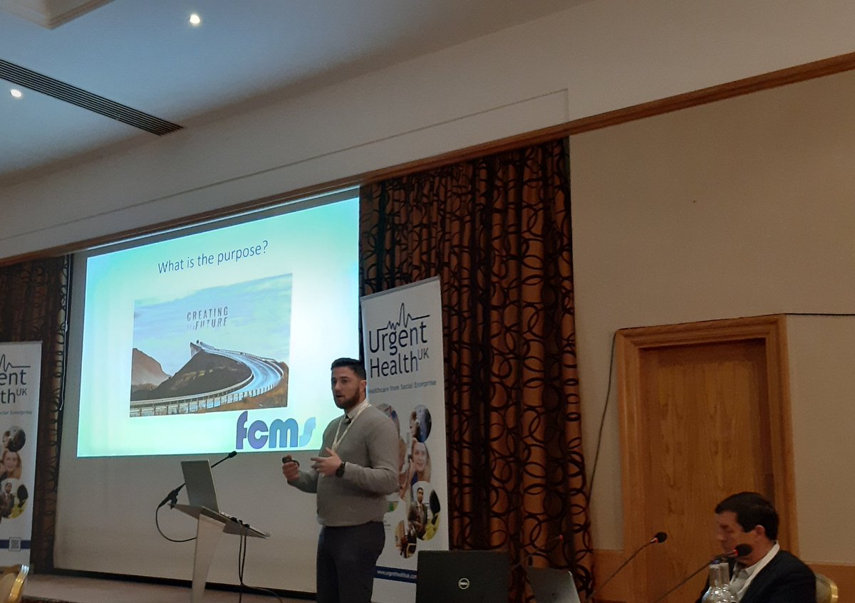 Lee_McGlynn's tweet photo. @SystemsNinja absolutely rocking it @UrgentHealthUK annual conference, describing @FCMSCares partnership with @DocAbode #brave #go-getting https://t.co/uOx16fjHIg
