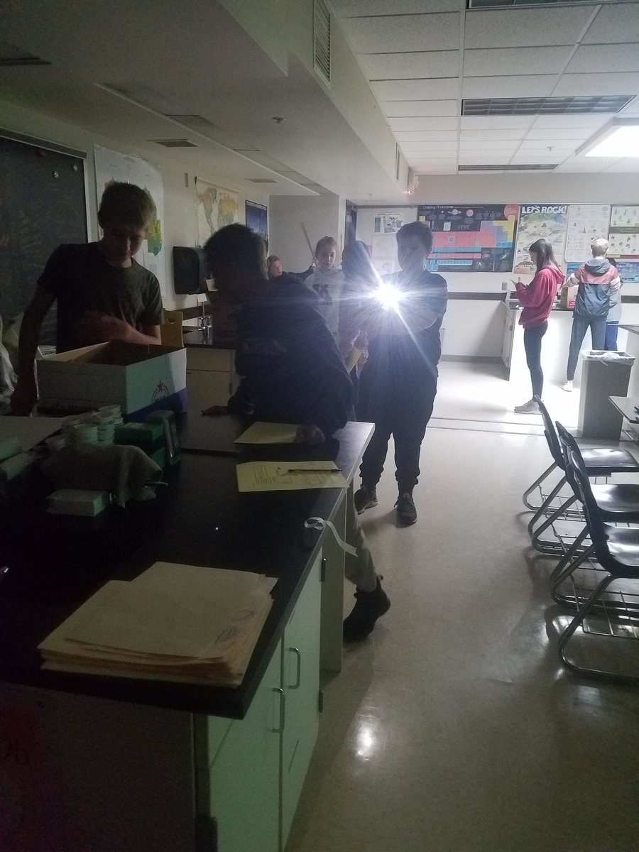 HannahWitzig's tweet photo. Yesterday, students used a "telescope" box to figure out how parallax shift can be used to determine the distances of stars (or flashlights, in this case). Their calculations were pretty close! https://t.co/NNGUeHgMTk
