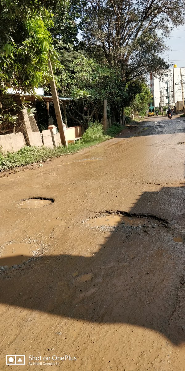 NikhilRan's tweet photo. Even after raising the ticket and getting assurance of repair in two weeks nothing has been done. It's worse than before. @BBMP_MAYOR @BBMPCOMM @Dkhallirising @CMofKarnataka @PCMohanMP @ArvindLBJP @BangaloreMirror 
Photos taken today, ticket raised last month. @kdevforum https://t.co/p1pPCWMcDy