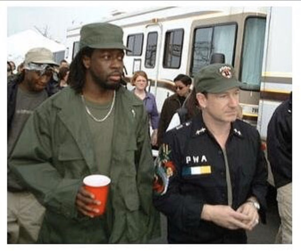 the_gardentarts's tweet photo. Net Aid was *20* years ago today. 😯That time #thegardentarts were hired for NetAid. (jds: purple shirt) 📸: @RollingStone #bono #u2 #netaid #jubilee2000 #newjersey #wyclef #wyclefjean https://t.co/Lq2uOkuTpR